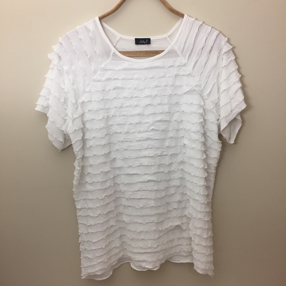 [Ashley J] White Ruffled Top
